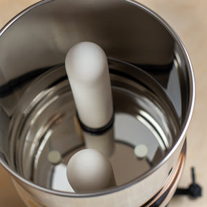 View inside top of British Berkefeld stainless steel drinking water gravity filter with filter candles mounted in place.