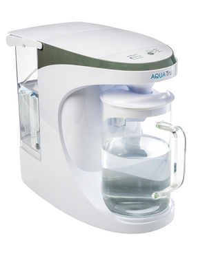 AquaTru Carafe water purifier during operation.