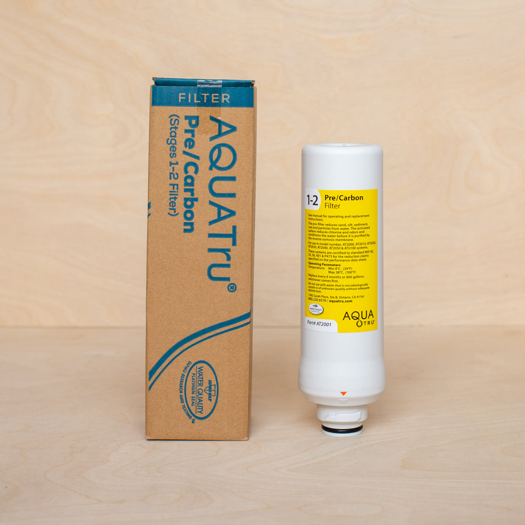 AquaTru Classic Pre/Carbon cartridge alongside packaging.